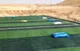 عملیات نصب چمن مصنوعی در روستای خاندان‌قلی بیجار آغاز شد/ گامی برای توسعه ورزش روستایی